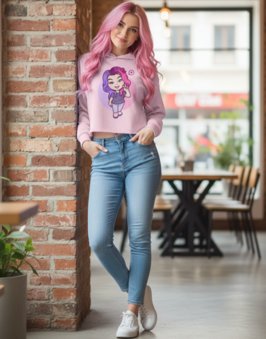 Woman wearing a pink sweatshirt with a graphic design in a casual setting