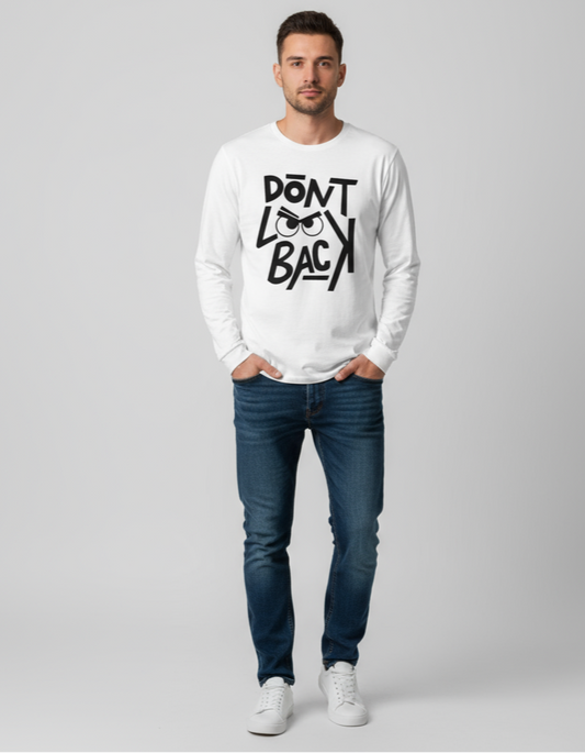 Man wearing a white sweatshirt with text and blue jeans on a gray background